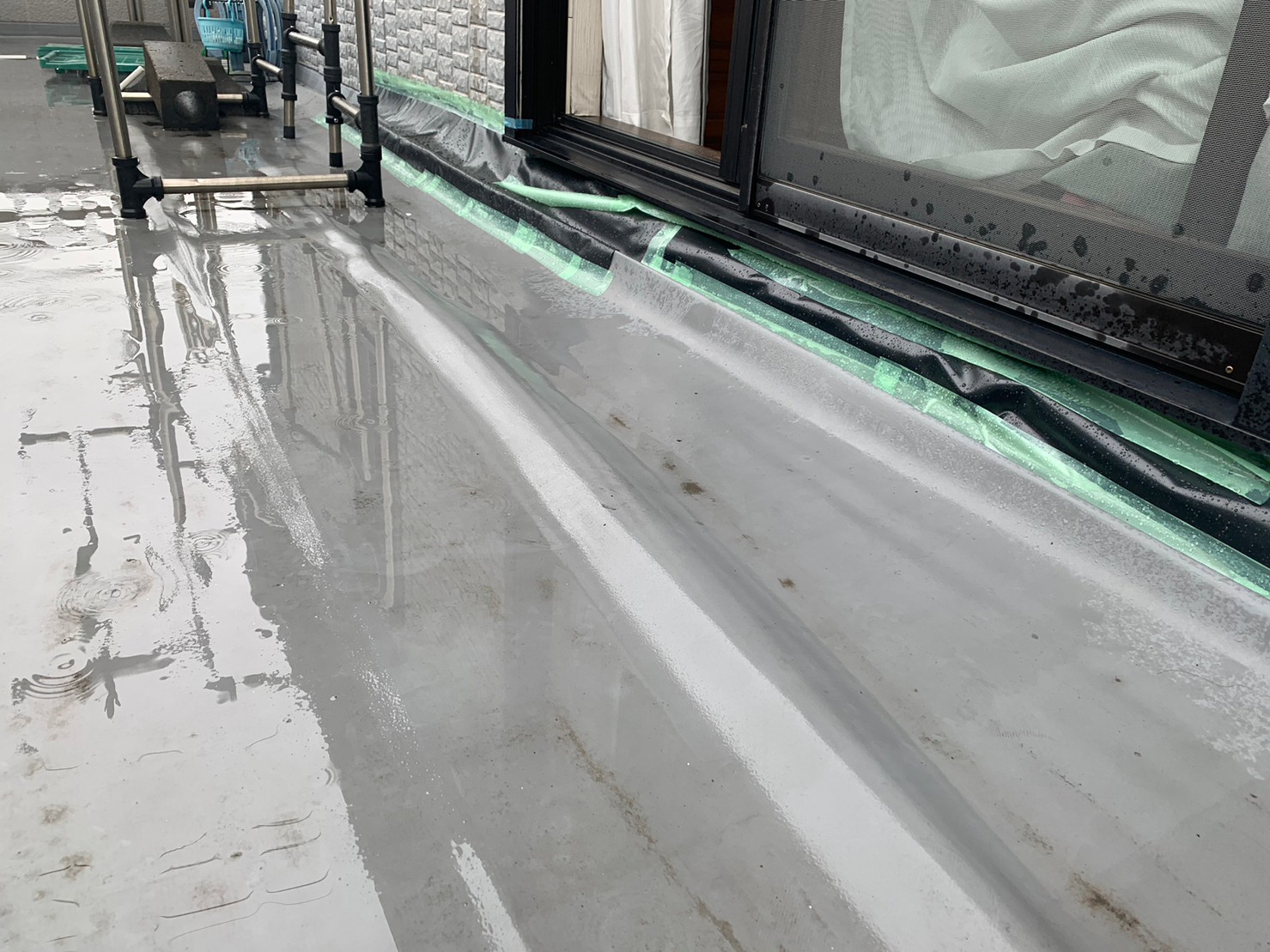 ベランダシートの膨れ写真