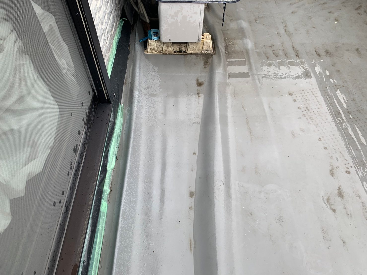 ベランダシートの膨れ写真